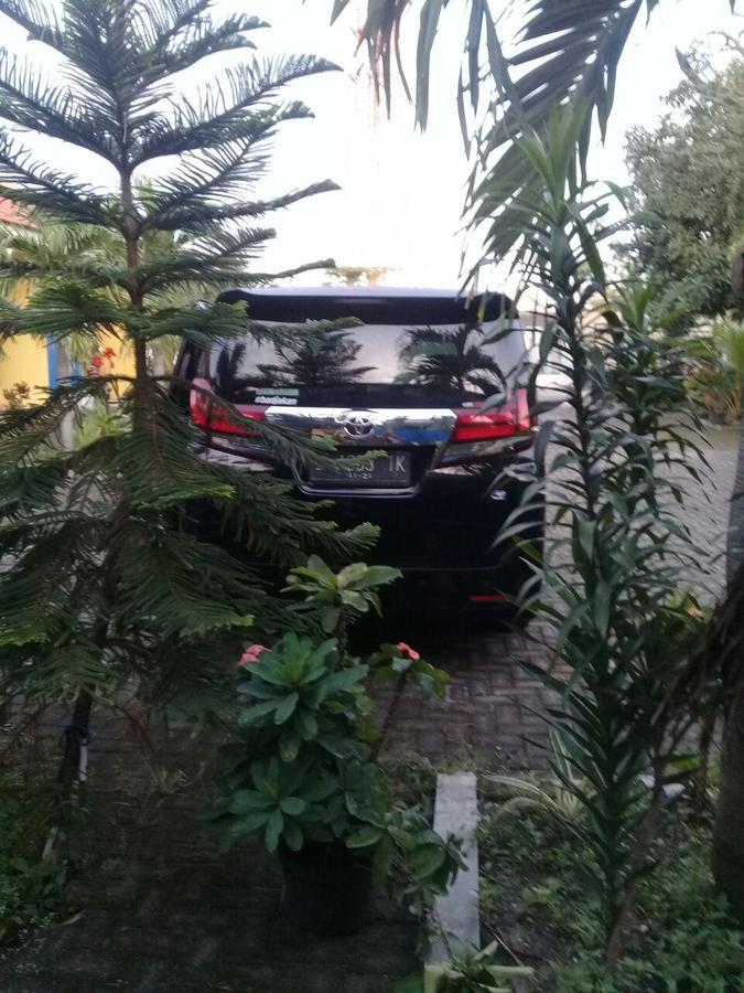 Kost Backpacker Hotel Sidoarjo Kültér fotó